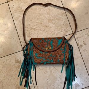 Vintage tooled western purse with teal accents
